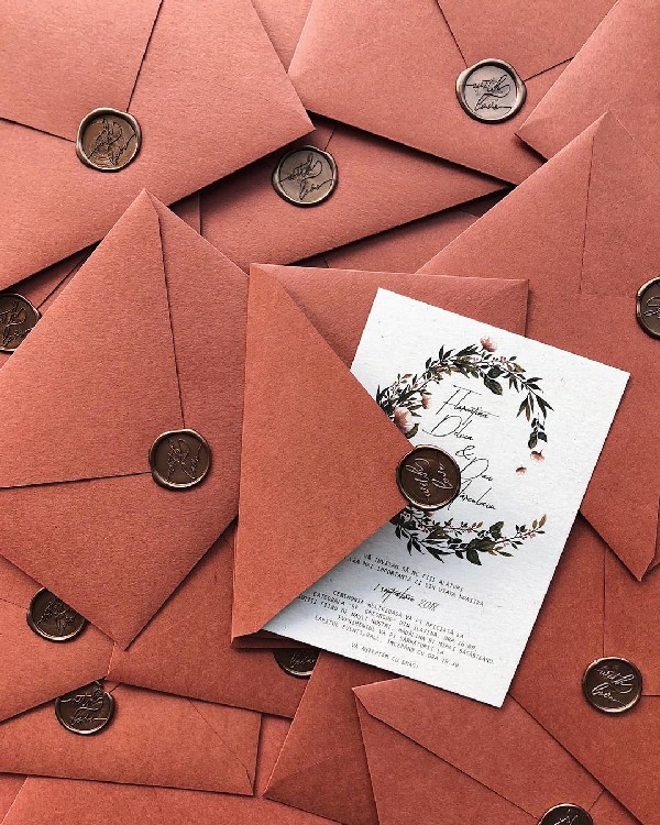 vintage elegant wedding invitation with burnt orange envelope