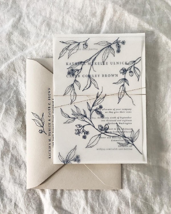 vintage ivory wedding invitation with flower vellum envelope