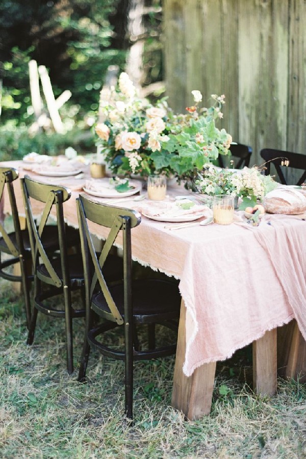 wedding reception tablescape with greenery and blush