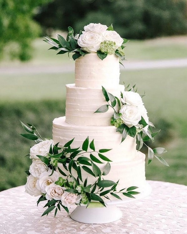 white and greenery buttercream wedding cake 