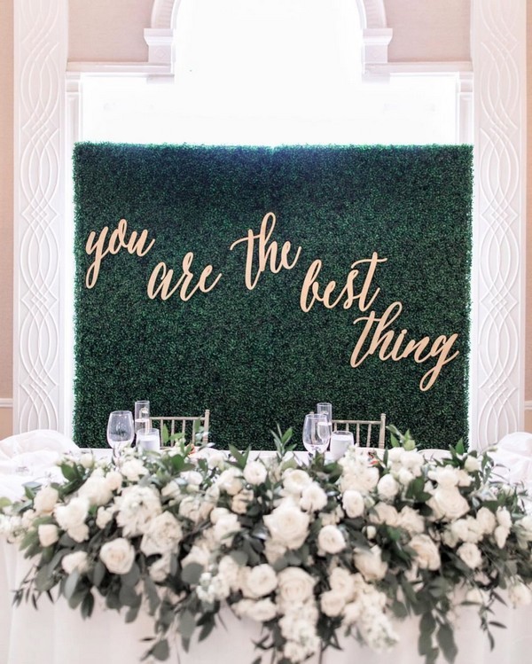 white roses and greenery sweetheart table 20