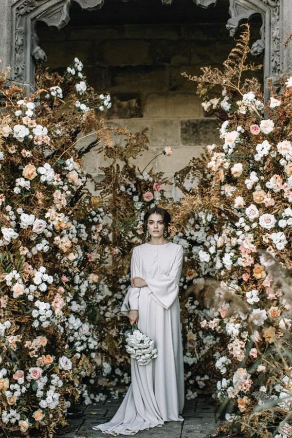 rust wedding color flower backdrop decor with mustard roses 