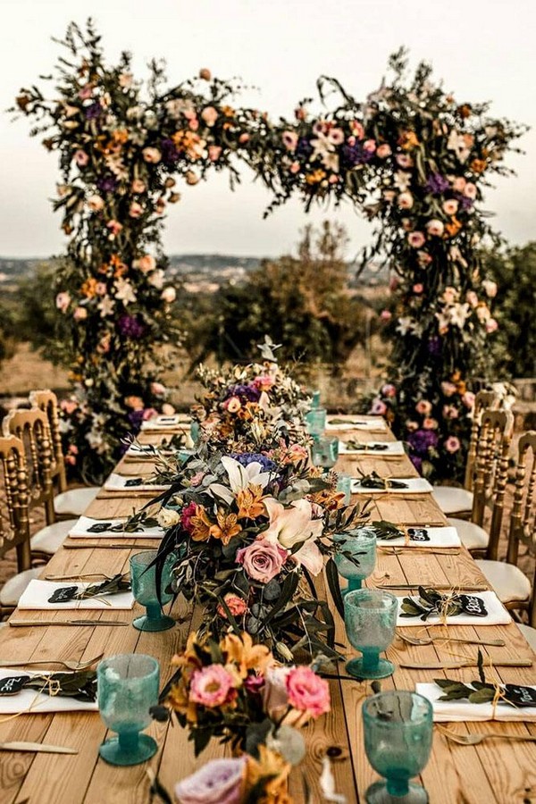 rust wedding color outdoor reception with bright flowers woodland table 