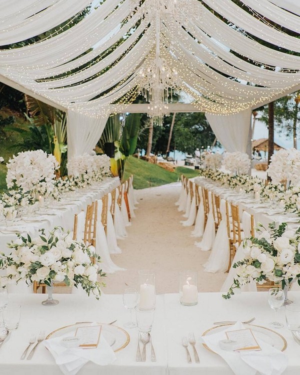 simple and greenery tented wedding reception