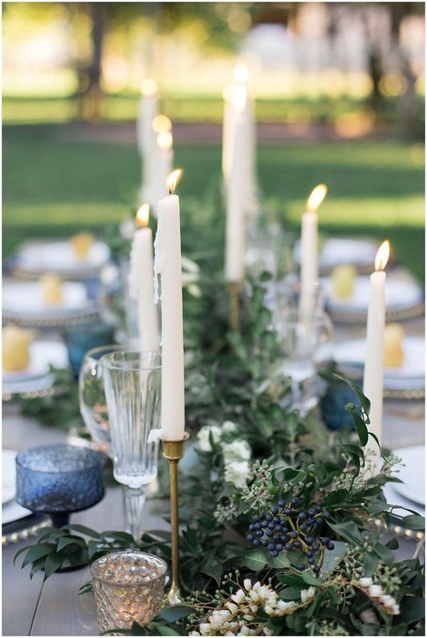 greenery and navy wedding centerpiece