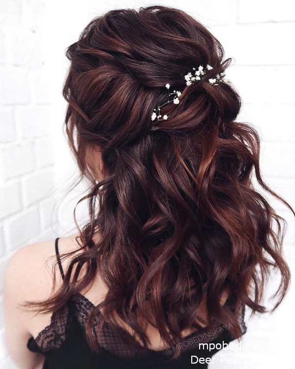 half up half down wedding guest hairstyle with baby breath