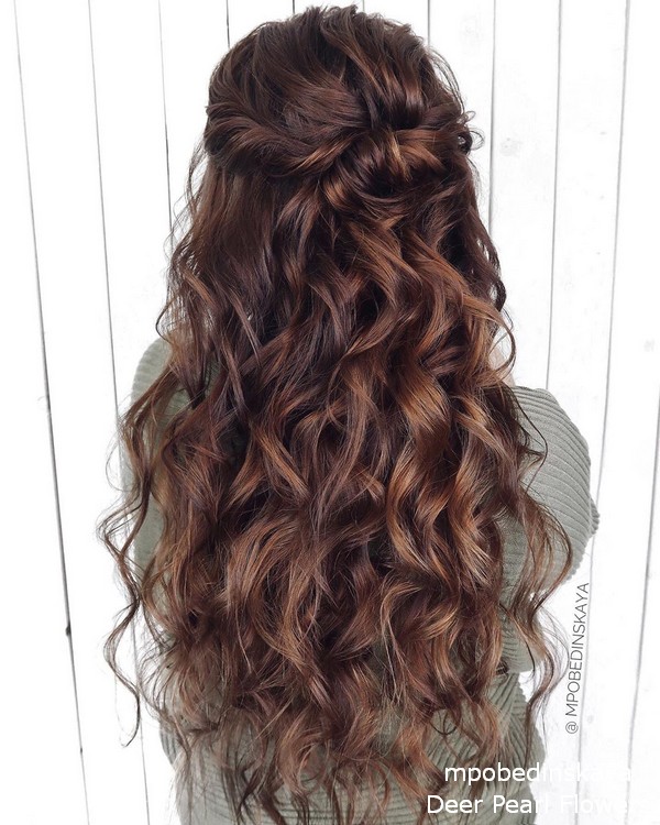 half up half down curly wedding guest hairstyles