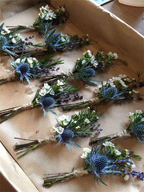 navy and greenery groomsmen flowers