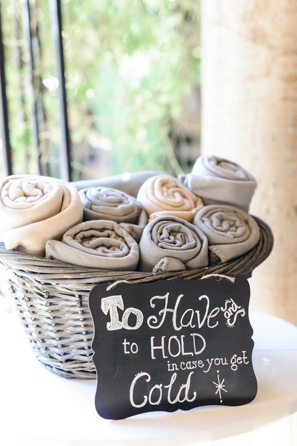 20 Creative Blankets for Wedding Guests at Your Winter Wedding 12 Blankets in a basket for guest