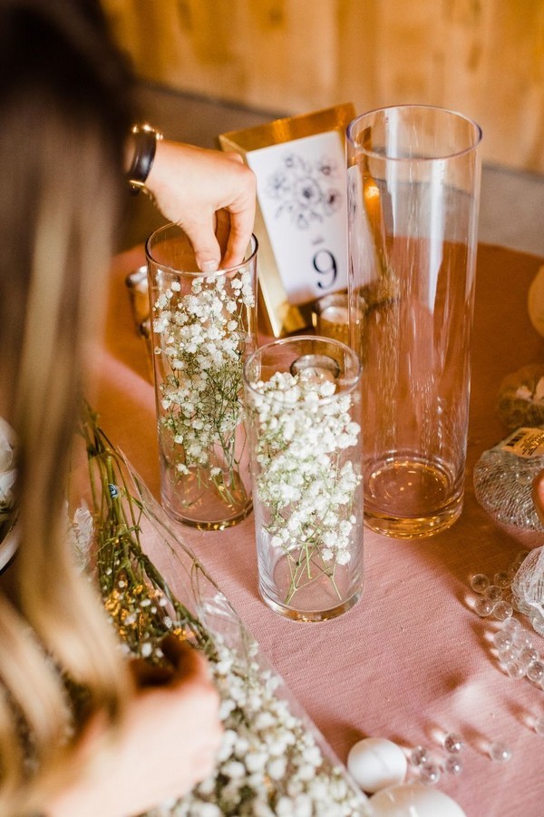 Top 20 Budget-friendly DIY Wedding Ideas for 2024 12 DIY wedding reception centerpieces baby's breath