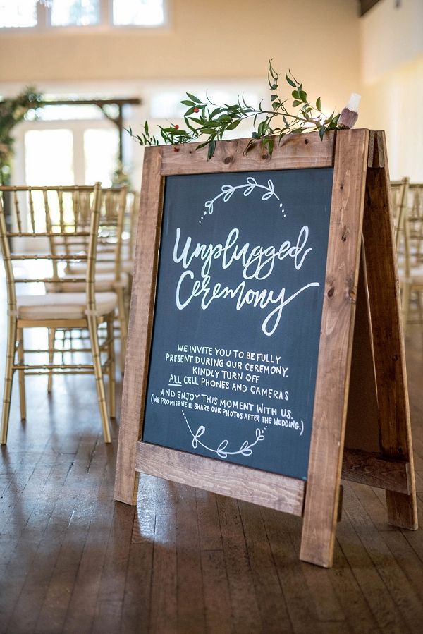 Handmade chalkboard sign for an unplugged wedding ceremony