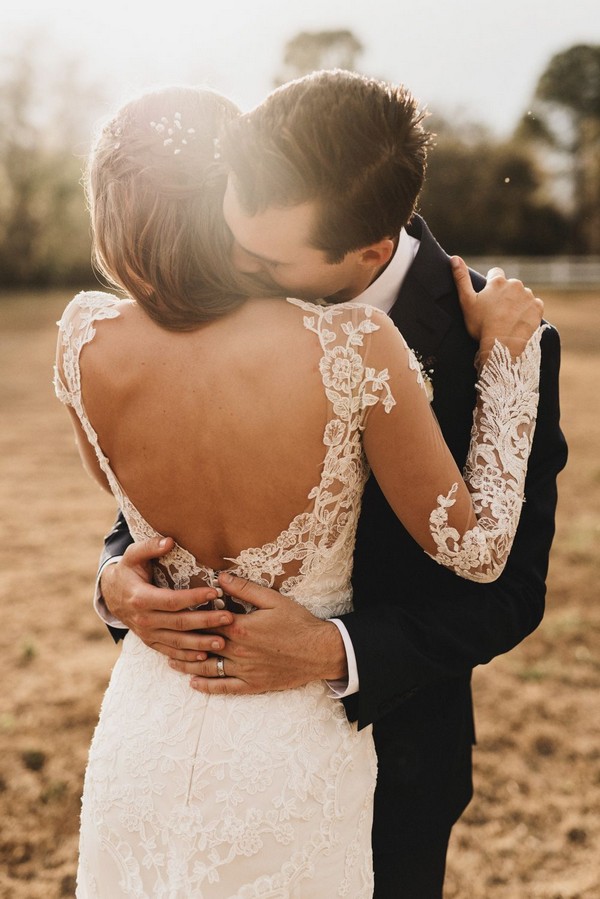 Romantic wedding photography ideas- love kiss on her shoulder