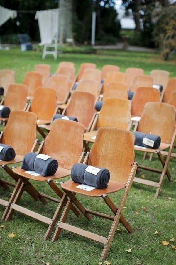 blankets on chairs as outdoor wedding favor ideas