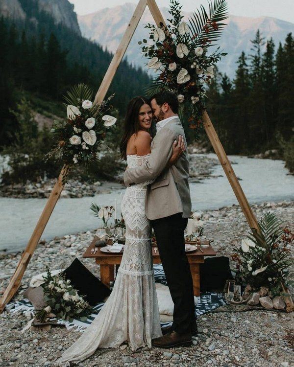 Boho Greenery and White Triangle Wedding Arch