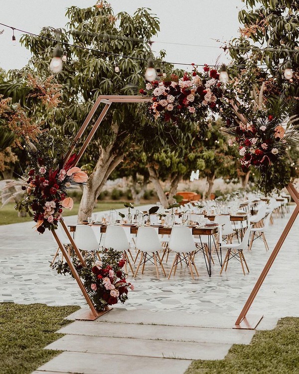 Geometric burgundy fall wedding arch backdrop