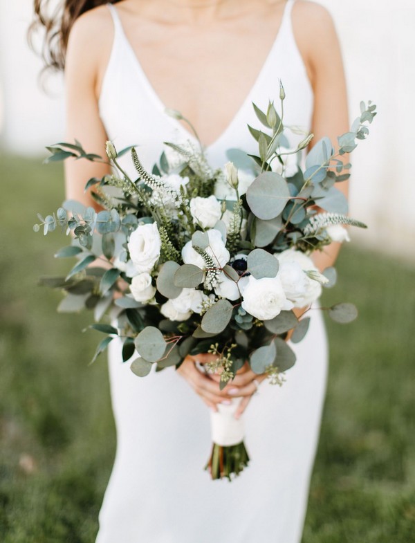 Minimalistic eucalyptus and white roses wedding bouquets