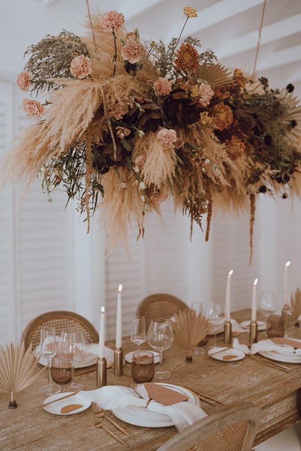 Pampas grass and earthy flowers hanging wedding centerpiece