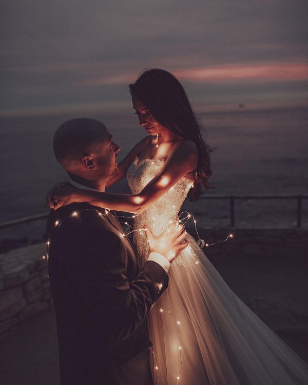 Top 6 Romantic Themed Wedding Photo Ideas for 2024 19 Romantic wedding photos with lights 1