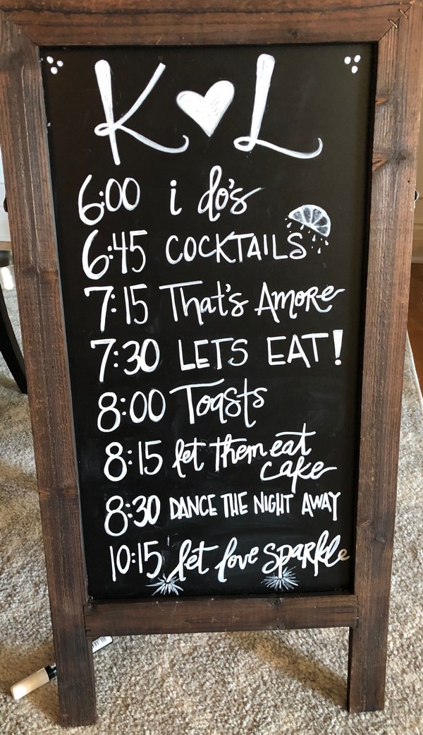 Wedding order of events chalk sign