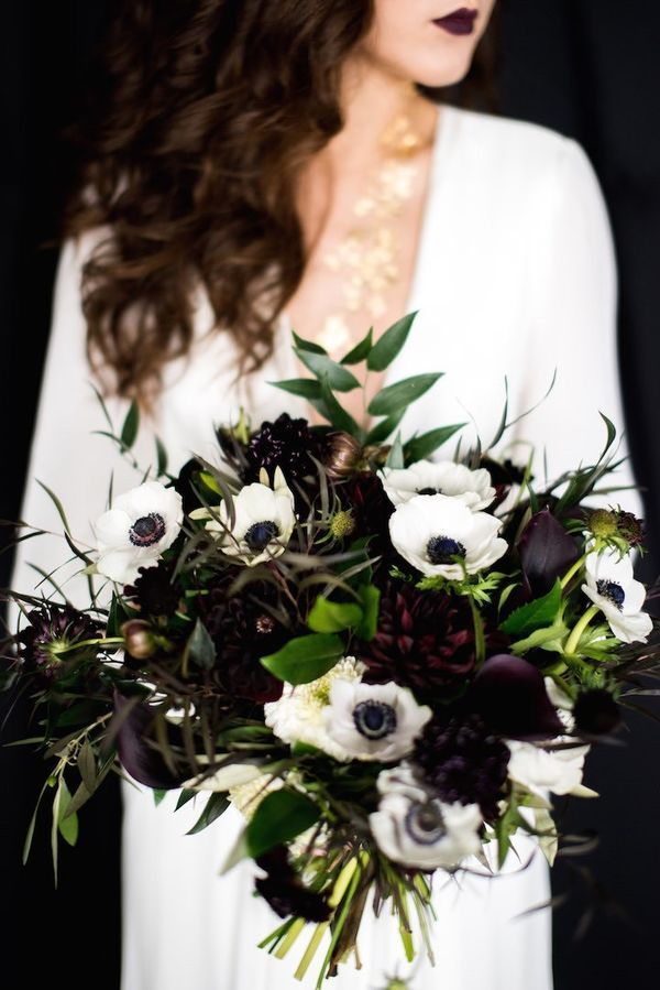 anemone wedding bouquet with deep eggplant flowers