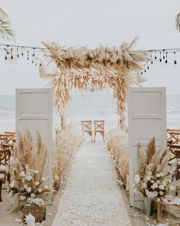 beach boho neutrals pampas grass wedding entrance decor idea