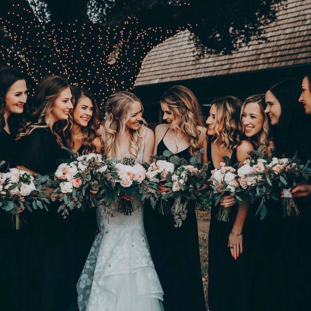 black bridesmaid dresses with greenery wedding bouquets