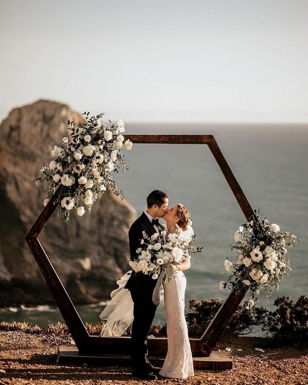 greenery and white geometric wedding backdrop