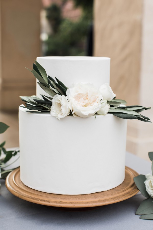 minimalist wedding cake with olive leaves