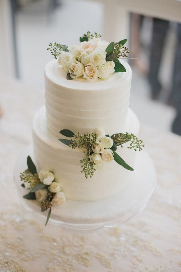 rustic buttercream wedding cake with seeded eucalyptus