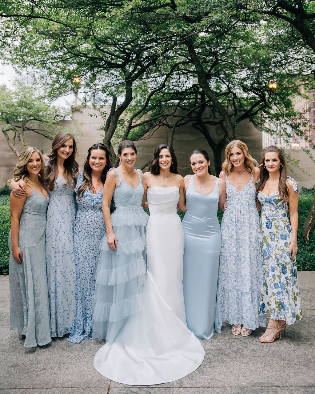 light blue bridesmaid gowns mismatched flower printed