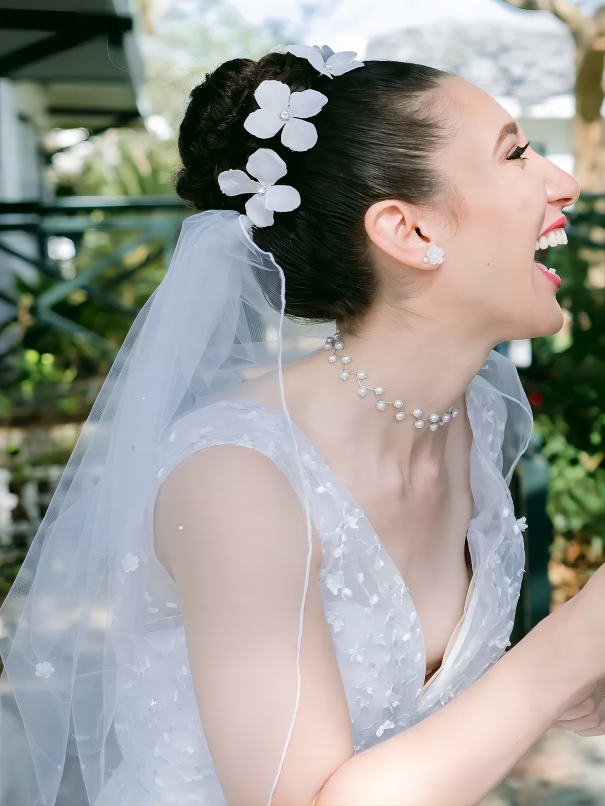 high bun wedding hairstyle with veil