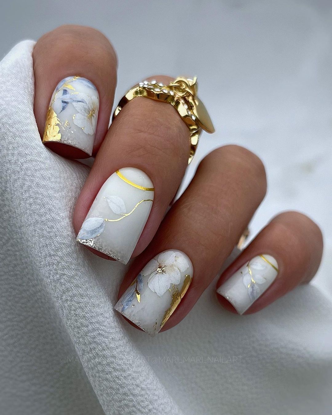 white floral printed wedding nail with gold accent
