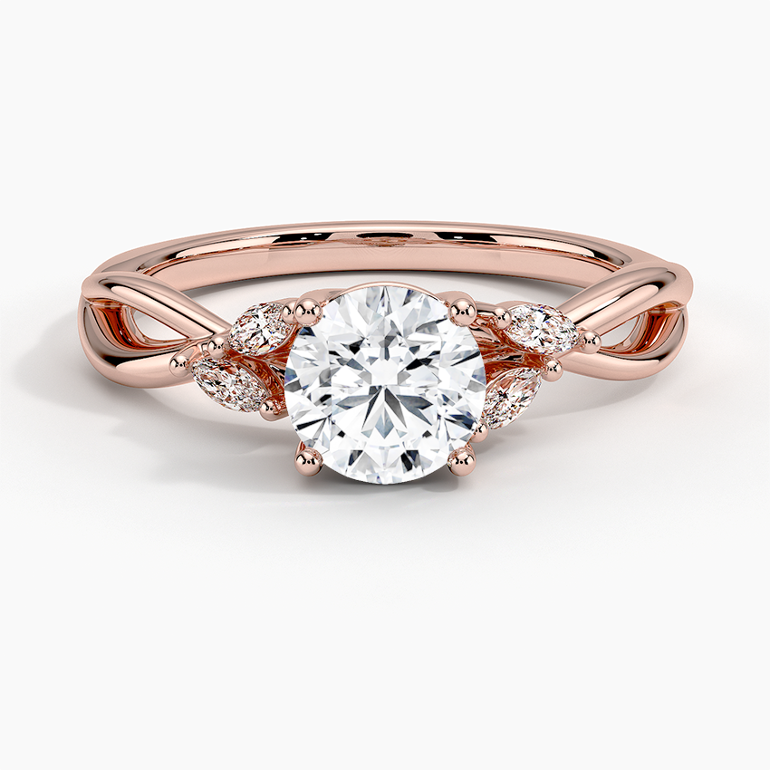 rose gold engagement ring with lustrous marquise diamond