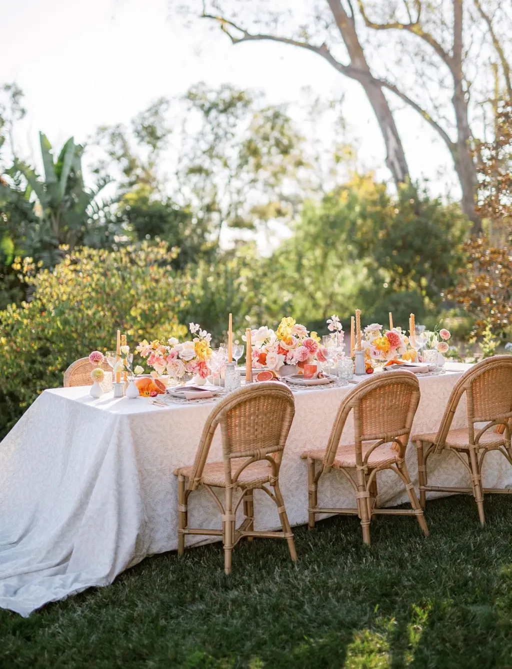 pink and orange floral and fun al fresco bridal shower ideas dining setup