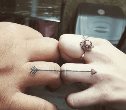 Connecting soulmate wedding ring tattoos
