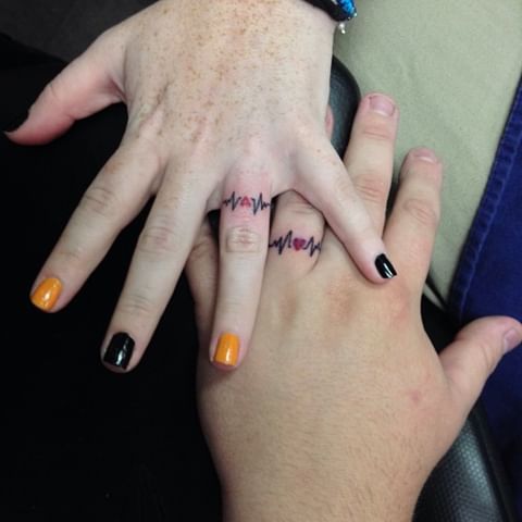 Heart Race Wedding Finger Tattoos