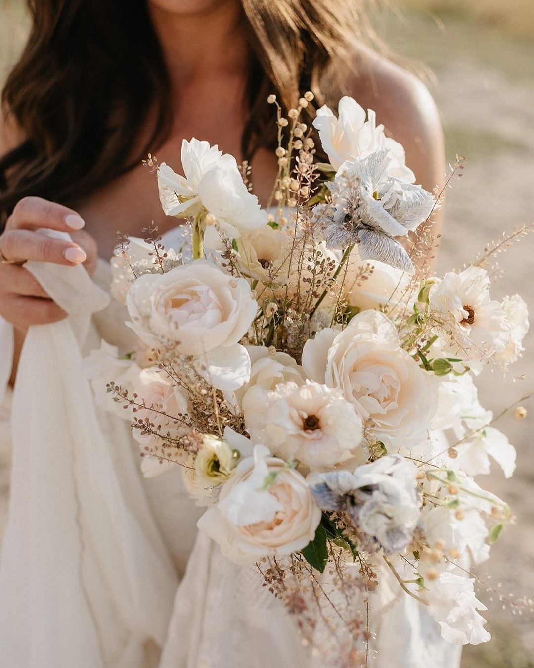 How Much Do Flowers Cost For A Wedding white wedding bouquet