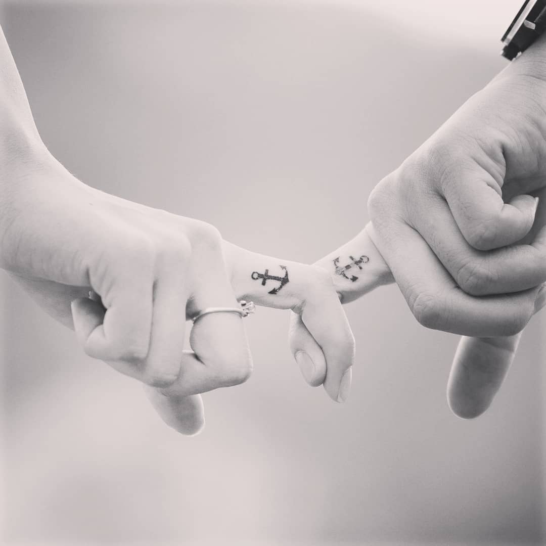 Matching Anchors Wedding Finger Tattoos