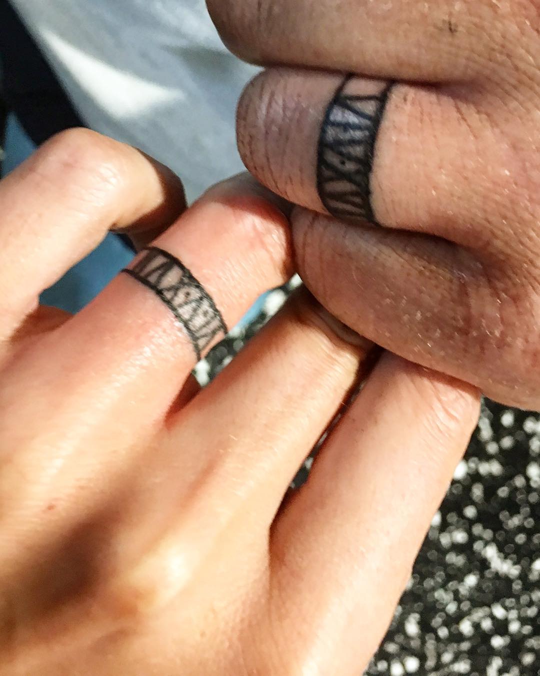 Roman Numerals Wedding Band Tattoo