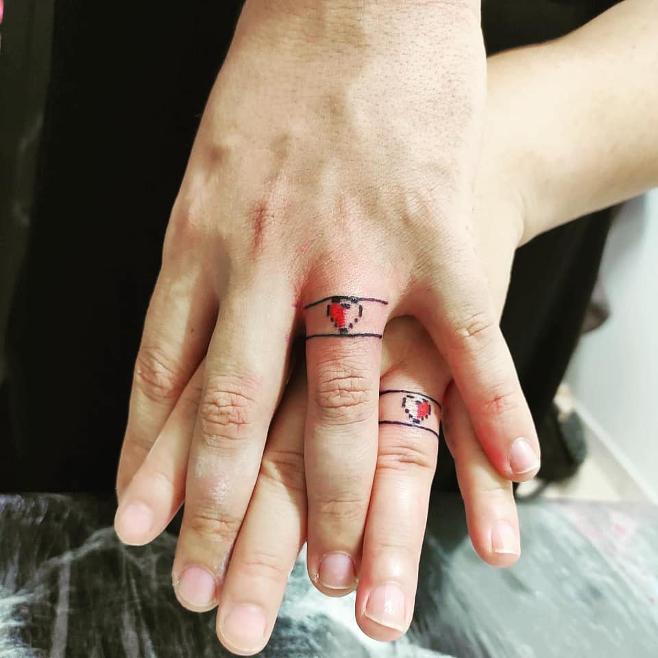 Shaded Hearts wedding ring tatto