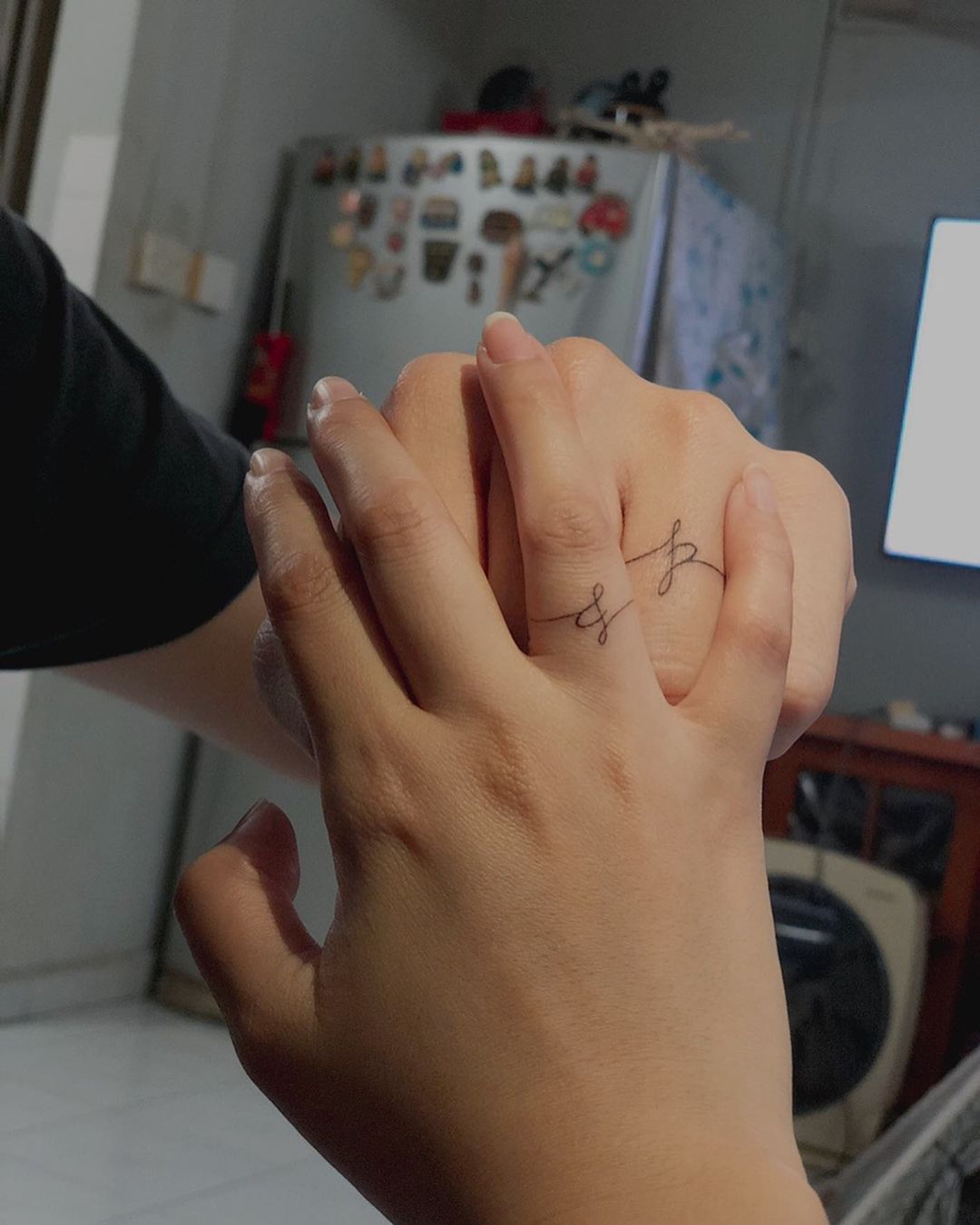Simplistic Script soulmate wedding ring tattoos