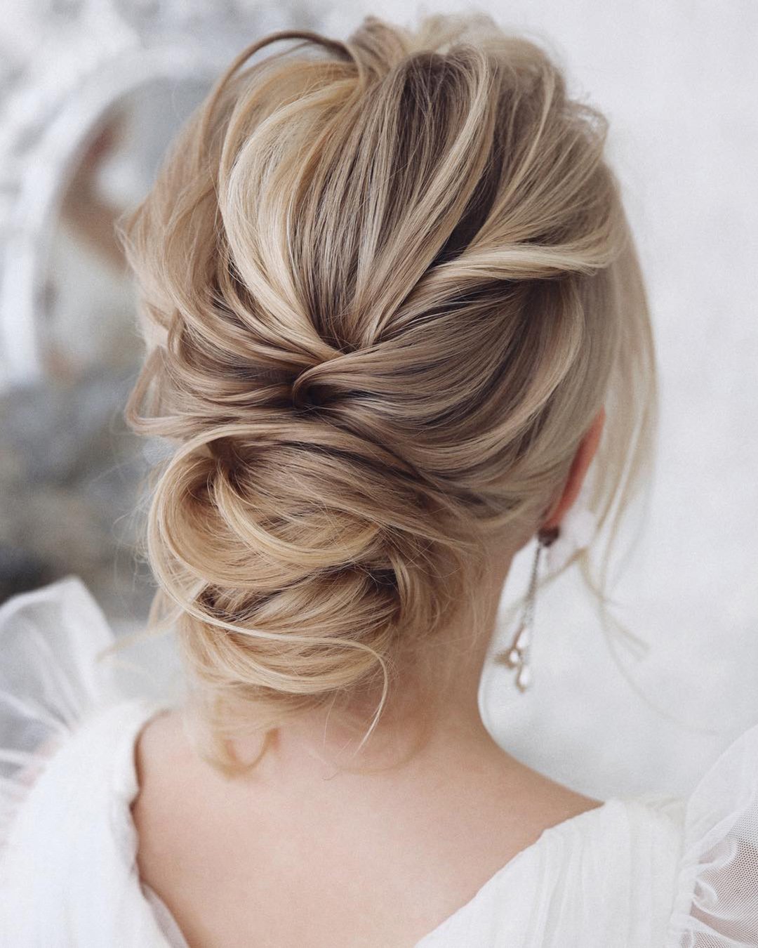 wedding hairstyles for medium hair low updo textured