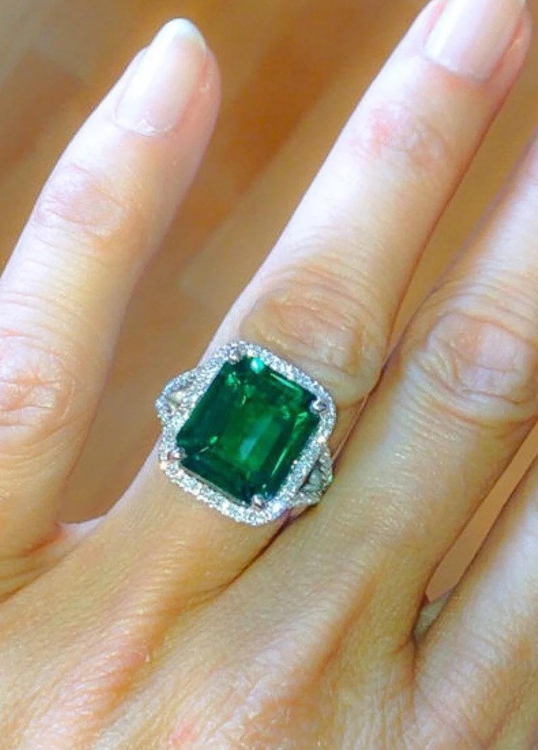 white gold halo emerald engagement ring