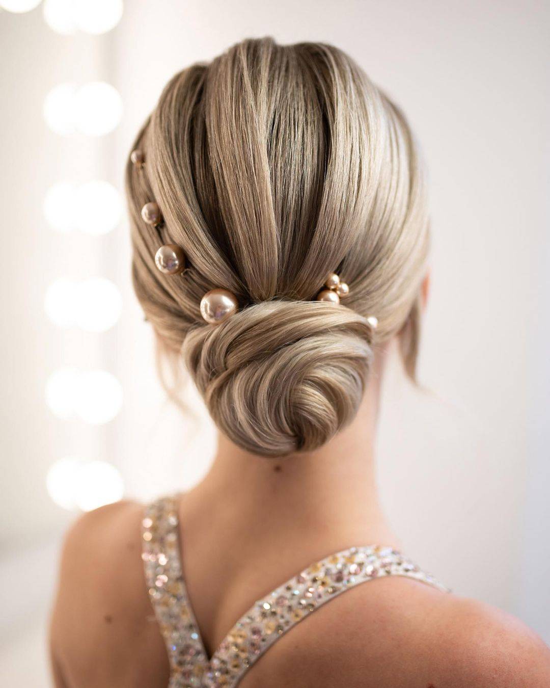 simple bridal updo with pearls