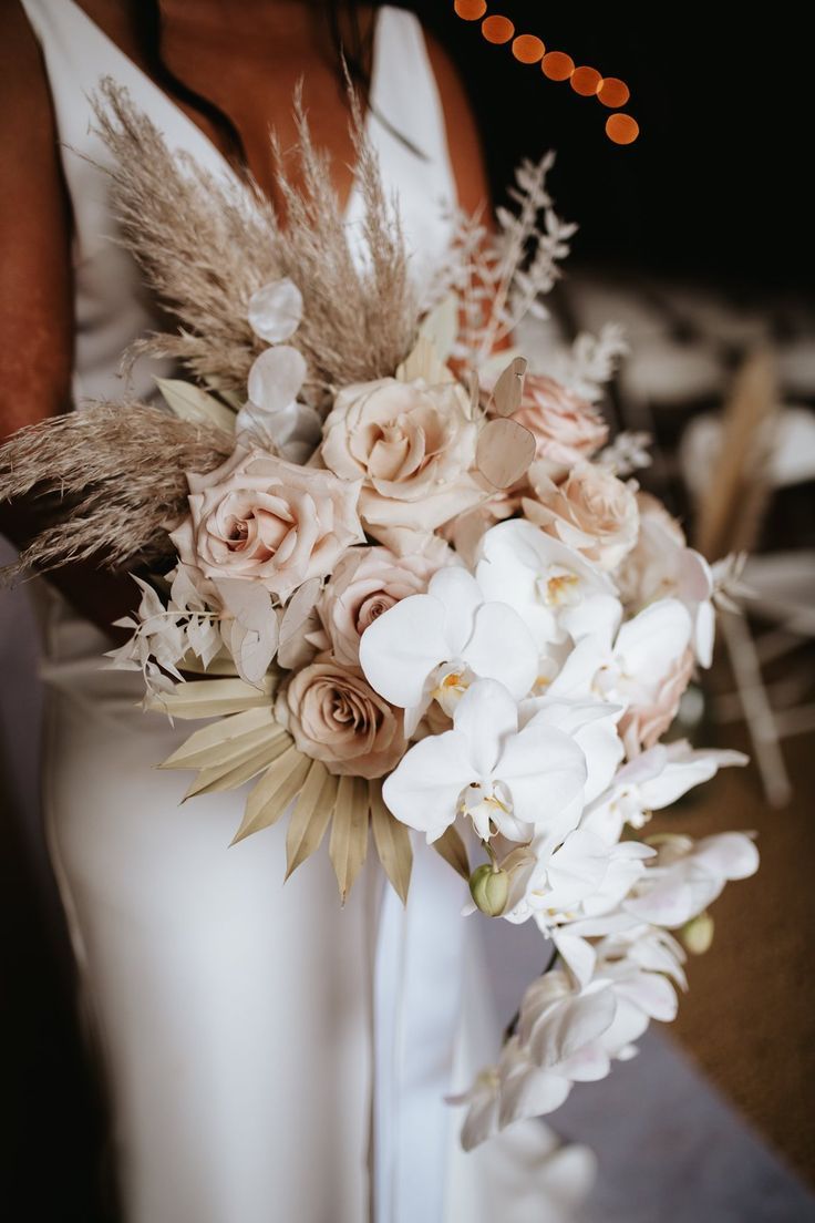 Orchid wedding bouquet bohemian pampas grass pink roses