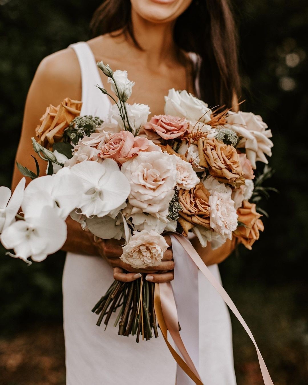 Orchid wedding bouquet bohemian terracotta roses