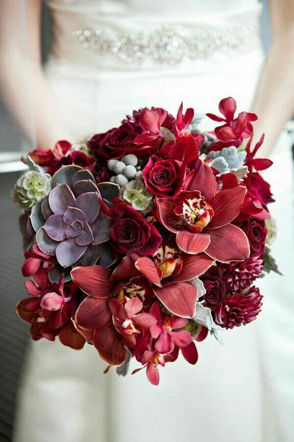 red orchid wedding bouquet with light purple succulent
