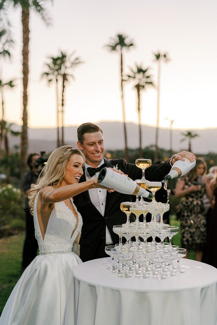 wedding champagne tower pour
