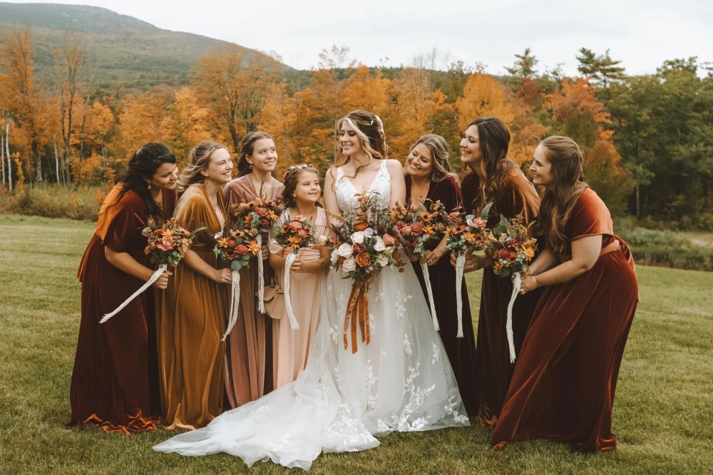 burgundy rust velevt bridesmaid dresses and sola wood flower fall wedding bouquet