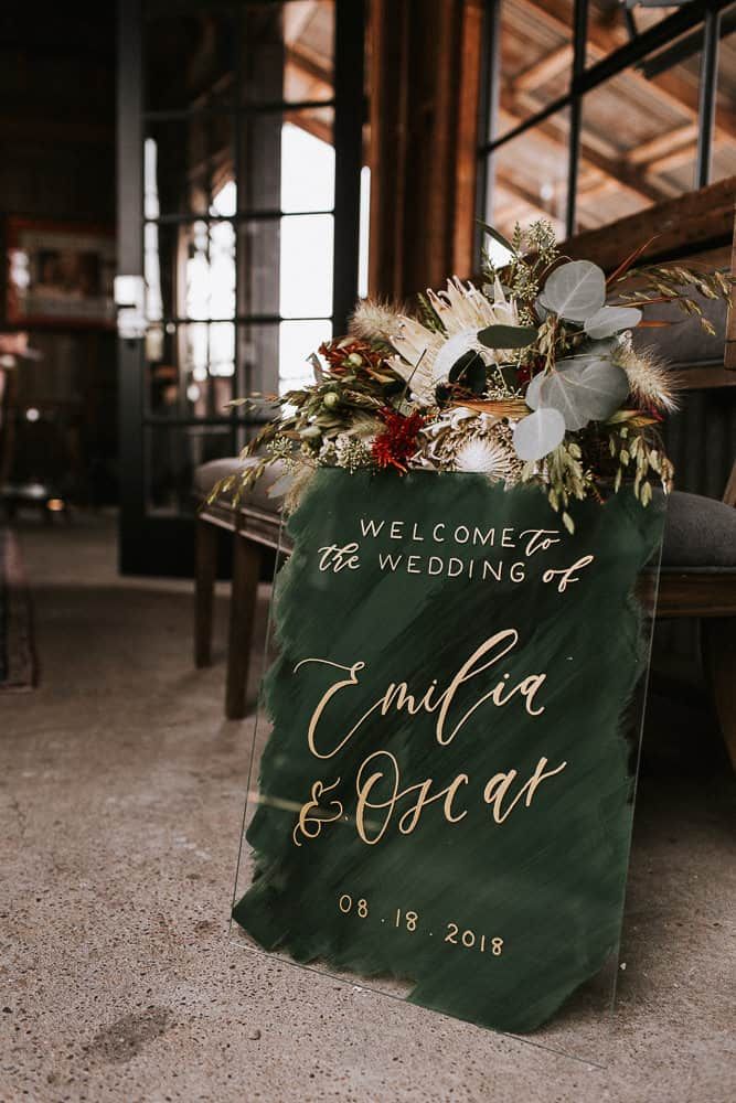 emerald green and gold acrylic wedding sign